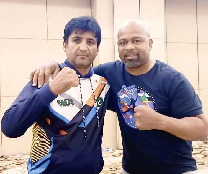 Waseem Ahmed with Roy Jones Jr
